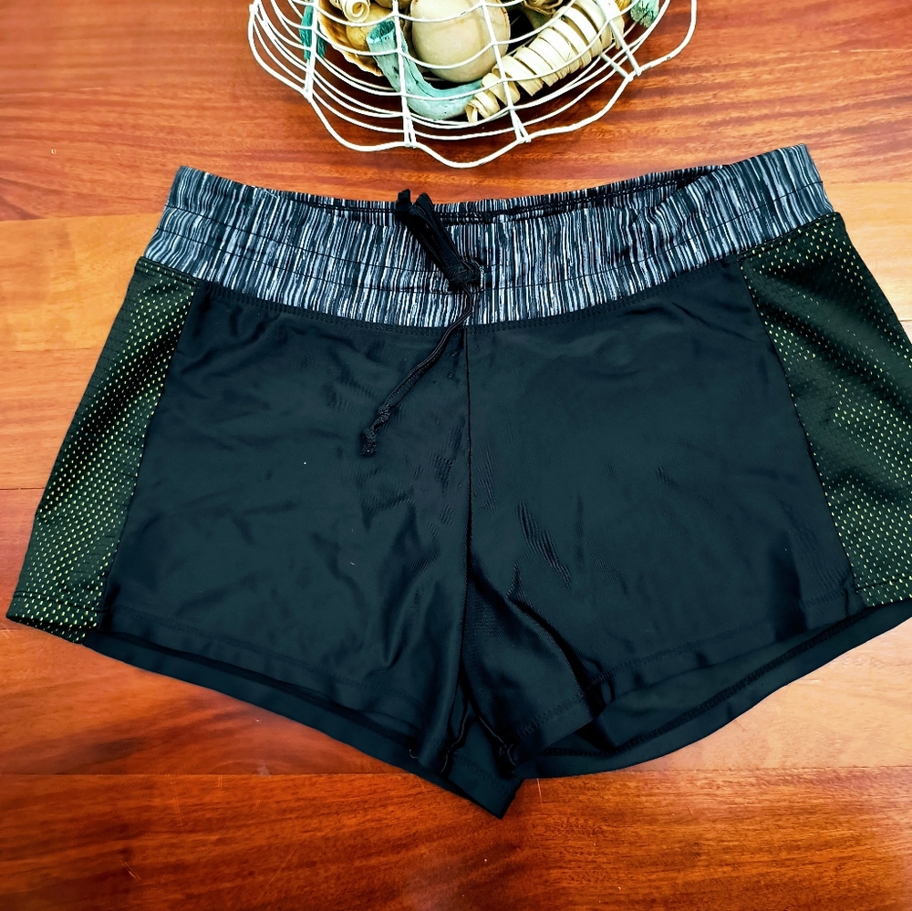 ZERO XPOSUR SWIMWEAR and athletic short. Excellent condition.
